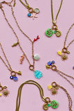 A Mosk Aqua Marine Charm Necklace
