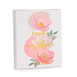 Gift set packaging with floral design and 'huxter' branding on a white Australia background