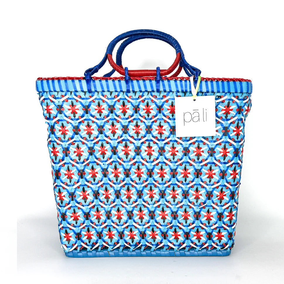 Patterned tote bag with red and blue accents on a white background Pali Basket Australia